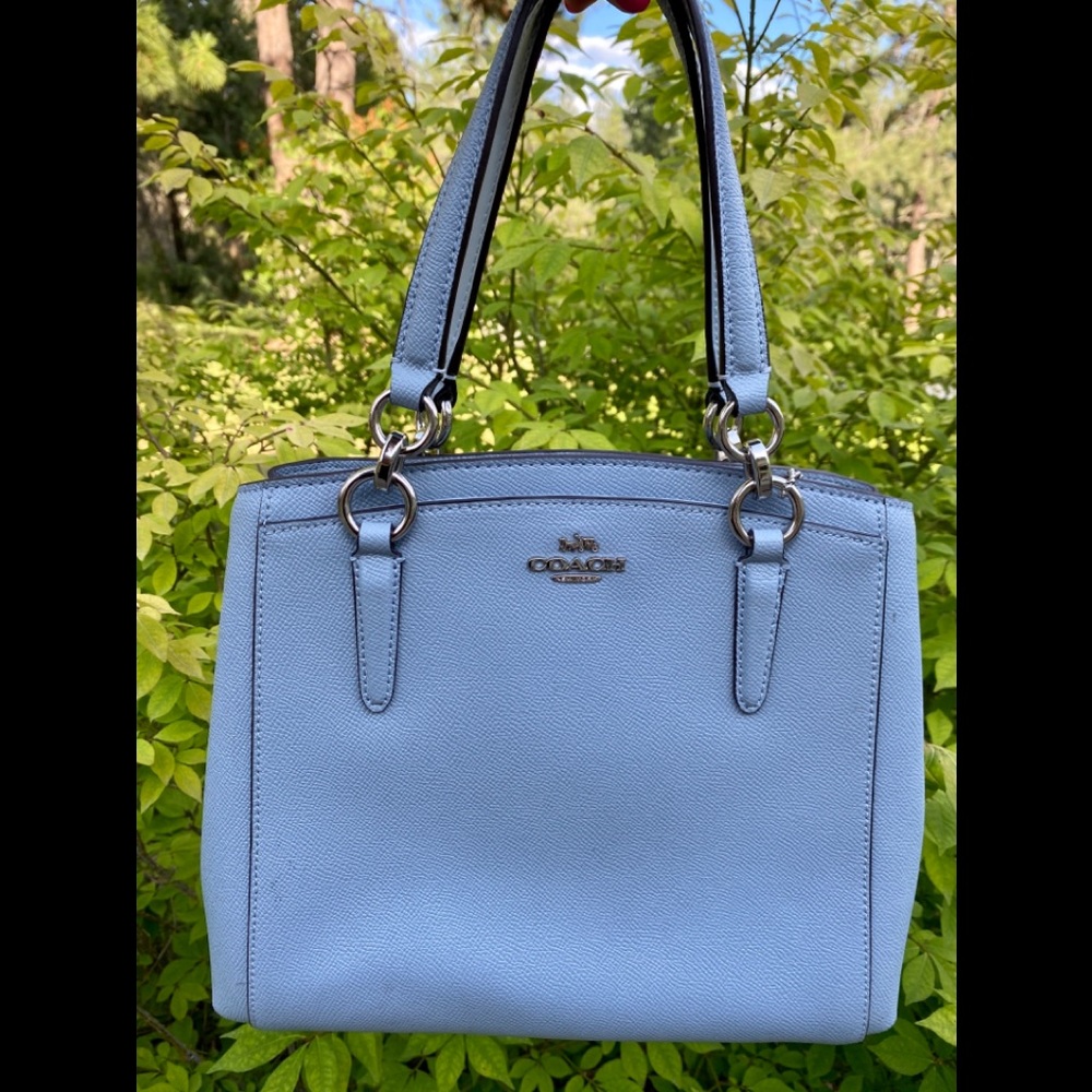 Slightly used light blue coach purse.